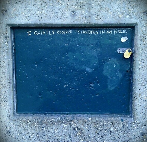 quietly Graffito: "I quietly observe, standing in my place"