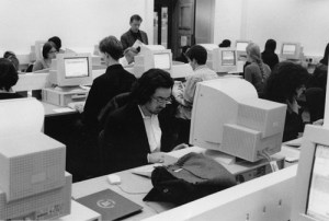 People working away in a computer suite