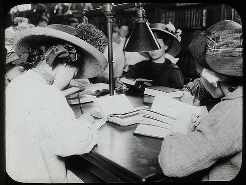 Women reading at a desk