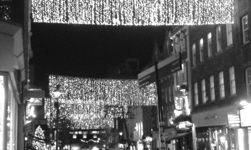 Christmas lights strung across street