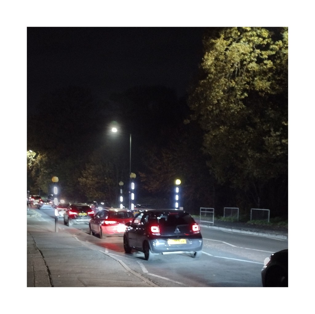A trail of cars at night time