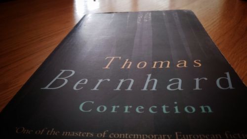 Cover of Thomas Bernhard's book, Correction. There is the outlines of trees on the cover.